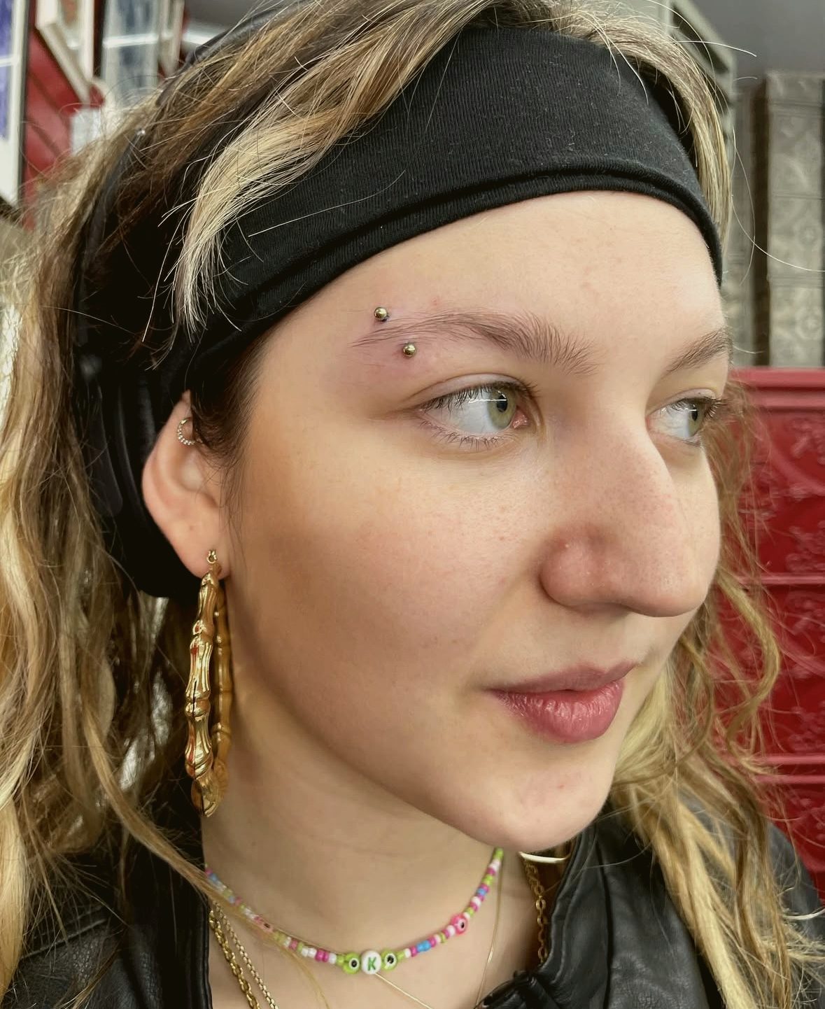 Eyebrow piercing, healed and bright — by Ana, Crown Ink Studio Brooklyn