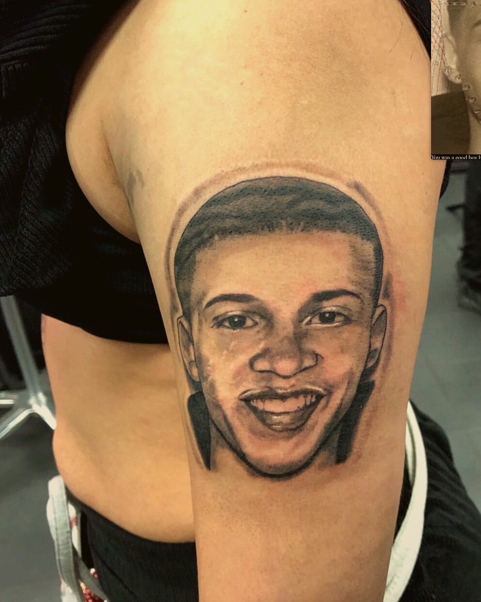 High-contrast portrait on the upper arm — by Eddie Stabz, Crown Ink Studio Brooklyn