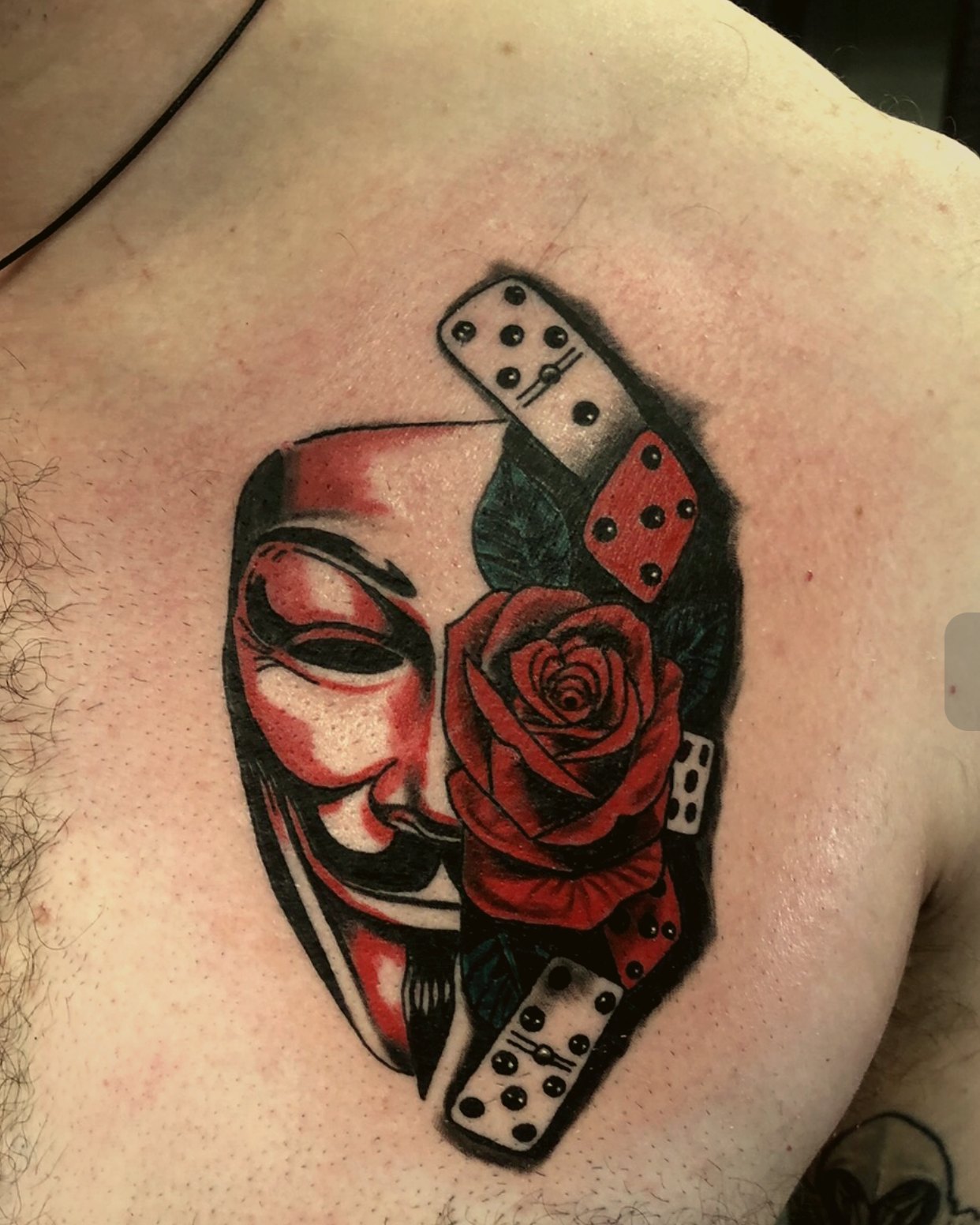 Mask, dice and rose — American Traditional meets realism — by Eddie Stabz, Crown Ink Studio Brooklyn