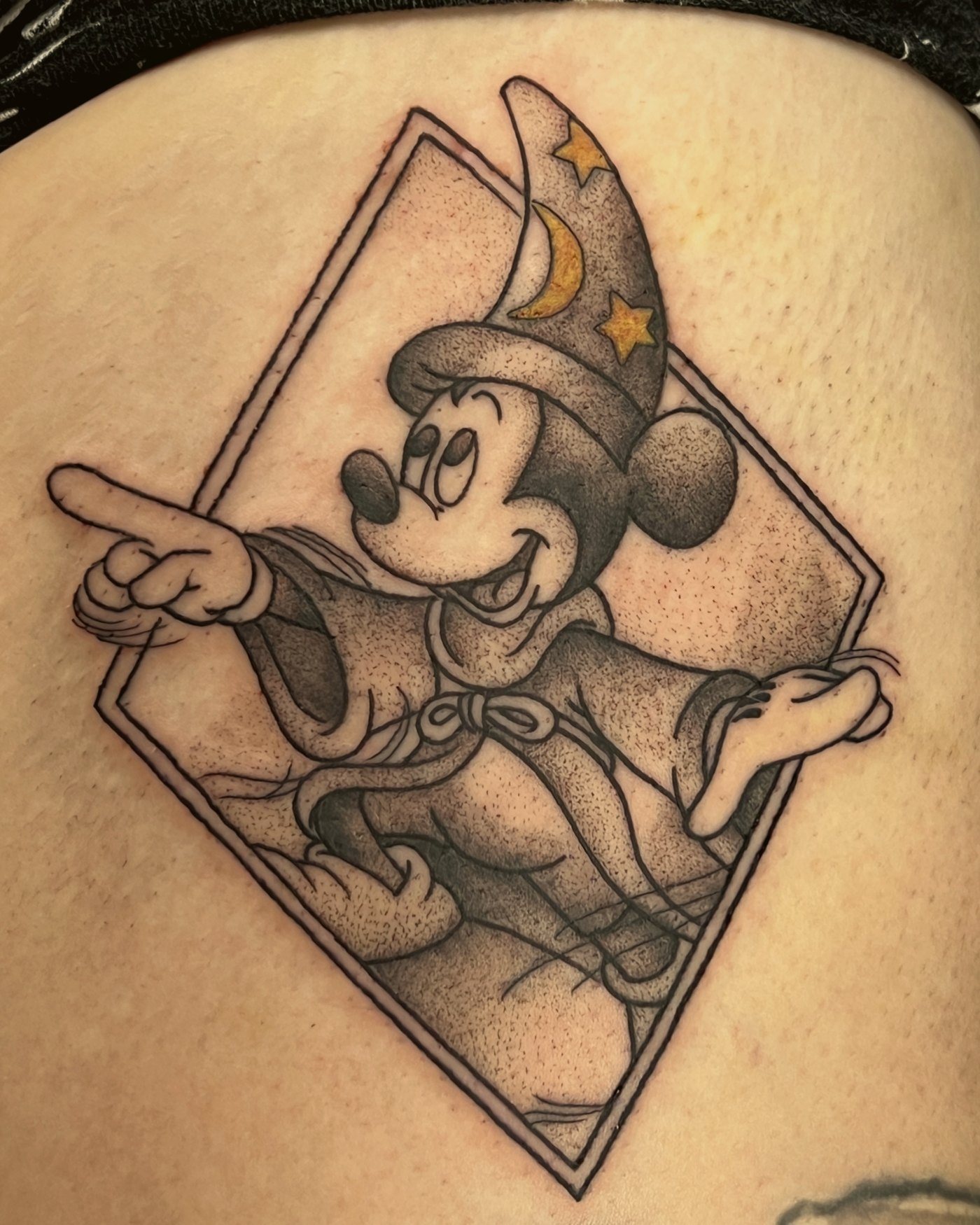 Dotwork Sorcerer Mickey on the upper arm — by Edwin Delarosa, Crown Ink Studio Brooklyn