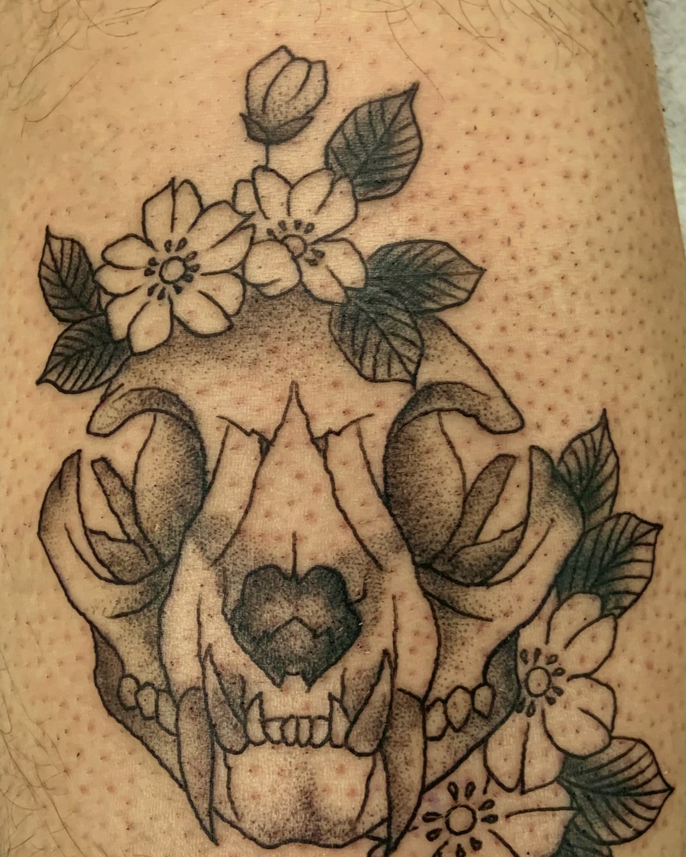 Skull and cherry blossoms in fine linework — by Edwin Delarosa, Crown Ink Studio Brooklyn