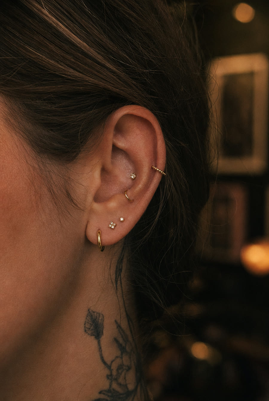 Curated ear stack in solid gold — by Lena Marsh, Crown Ink Studio Brooklyn