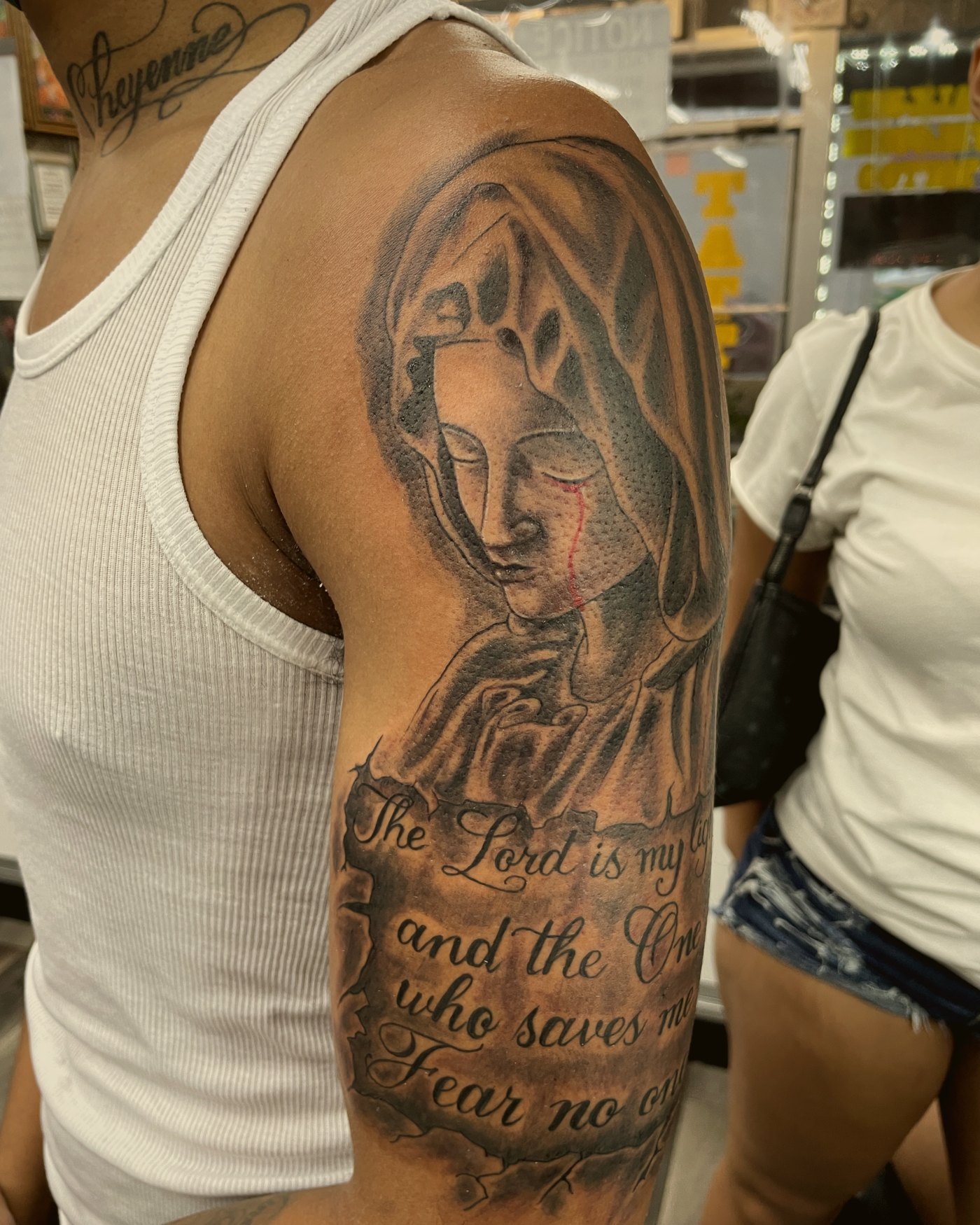 Black & grey Virgin Mary with scripture, upper arm — by Paul Aroca, Crown Ink Studio Brooklyn
