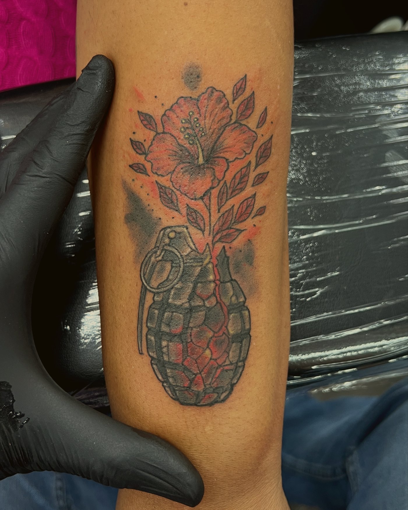 Grenade with a blossom, black & grey with color — by Paul Aroca, Crown Ink Studio Brooklyn