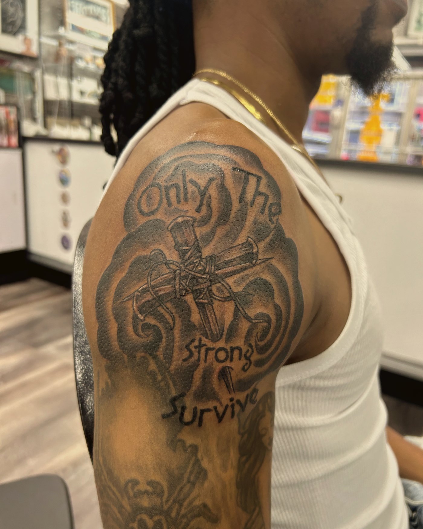 'Only the strong survive' shoulder piece — by Paul Aroca, Crown Ink Studio Brooklyn