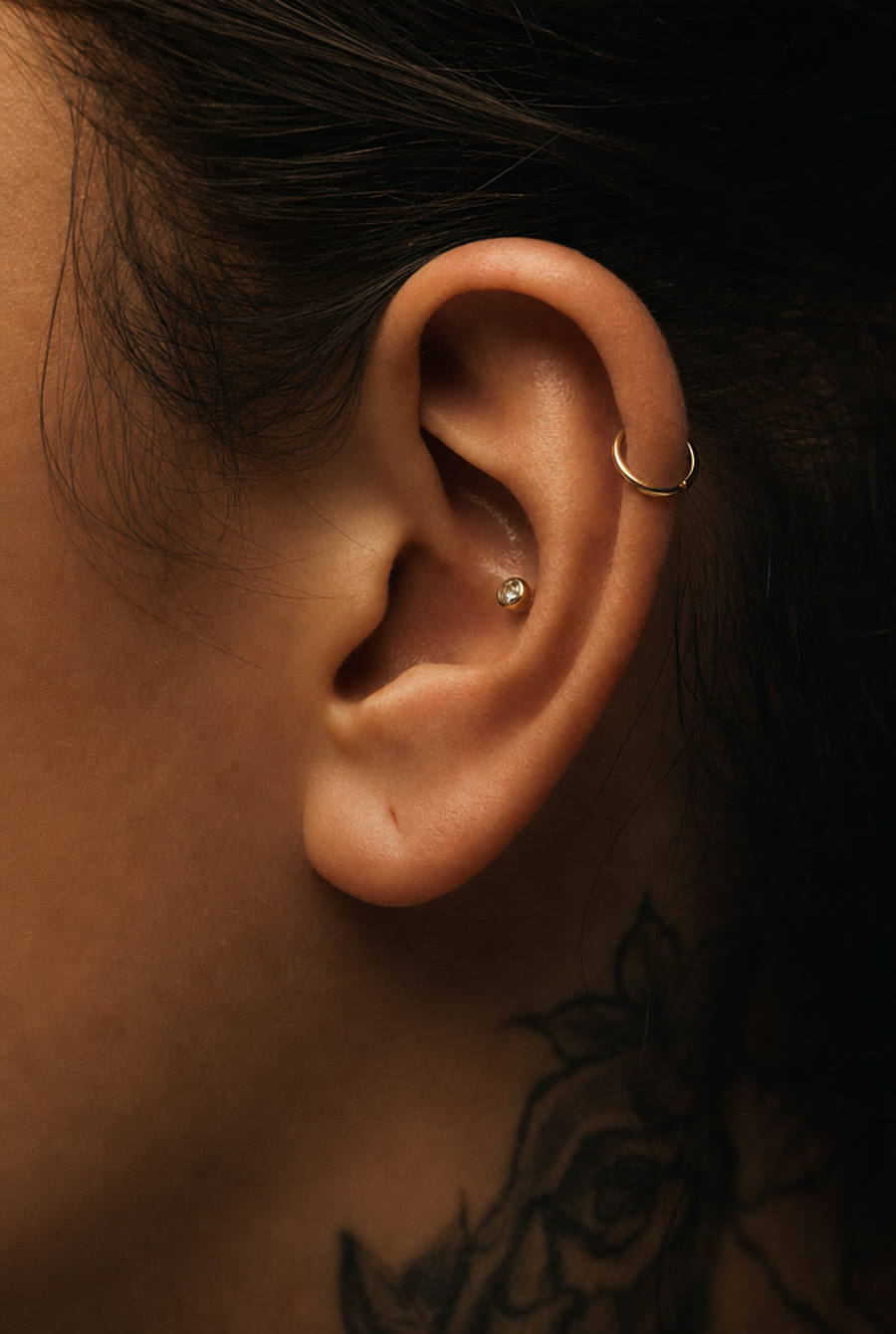 Gold helix hoop and gem conch — by Theo Park, Crown Ink Studio Brooklyn