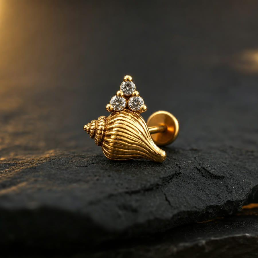 Gem Cluster Conch — 14k gold top · titanium post · 3-gem cluster — Crown Ink Studio jewelry, Brooklyn